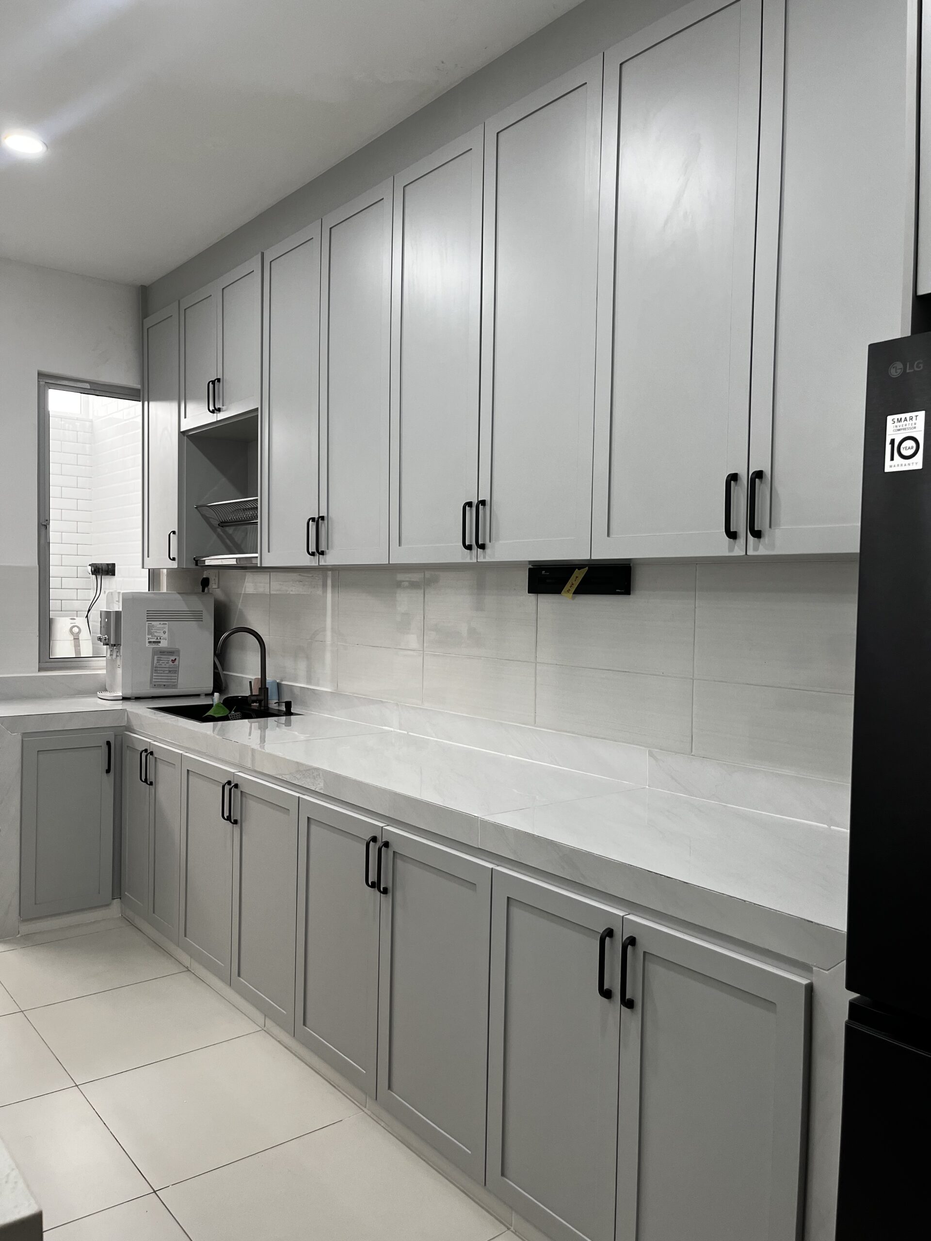 Grey minimalist kitchen cabinet by EUKA Living